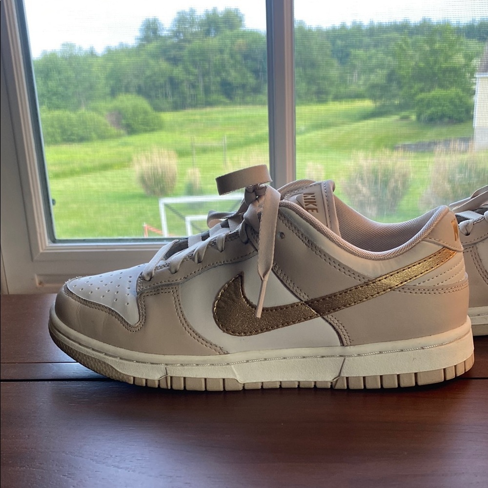 Nike Women's Shoes in White and Gold